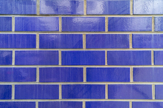 Vibrant dark blue tiles on a wall of a building Sydney NSW Australia