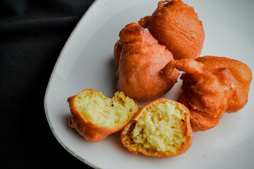 Orang-orang cake is a typical snack from Indonesia. Made from a mixture of wheat flour and bananas, then fried.