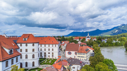 Fototapeta na wymiar Fussen city drone view - HD pictures - Germany, Bavaria, Drone view of the riverside town - Europe attractions 