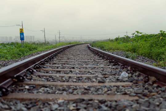 A sentimental railroad view on a rainy day