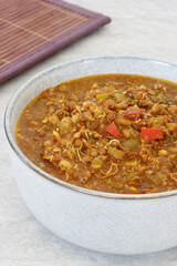 Sprouted Horse Gram Kurma (Korma) dish in a bowl. Indian cuisine.