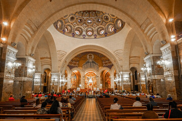 A fragment of the interior space of Basilica of the Virgin Mary of Rosaire, Lourdes, France.