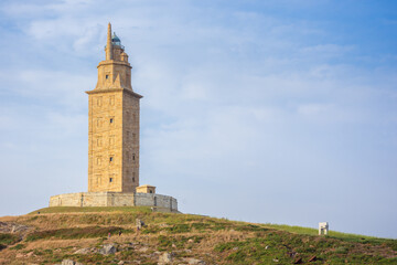 Fototapeta na wymiar Tower of Hercules, the almost 1900 years old and rehabilitated in 1791, 55 metres tall structure is the oldest Roman lighthouse in use today and overlooks the Atlantic coast of Spain from A Coruna.
