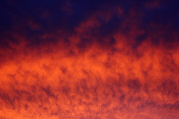 abstract background with fiery clouds at sunset