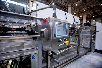 Bottling factory. Beverage production with conveyor belt machines