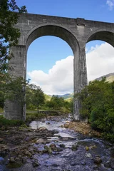 Tuinposter Glenfinnanviaduct The Glenfinnan Viaduct in the Scottish highlands