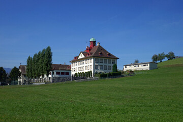 Fototapeta na wymiar Schulhaus Meggen