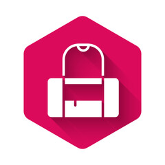 White Sport bag icon isolated with long shadow background. Pink hexagon button. Vector