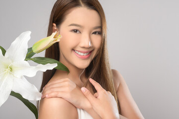 Portrait of beautiful asian woman over white background studio, skin care and beauty concept