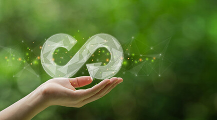 Circular economy concept. Hand holding circular economy low Polygonal on a green background. circular economy for future growth of business and design to reuse and renewable material resources.