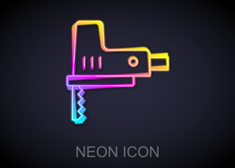 Glowing neon line Electric jigsaw with steel sharp blade icon isolated on black background. Power tool for woodwork. Vector