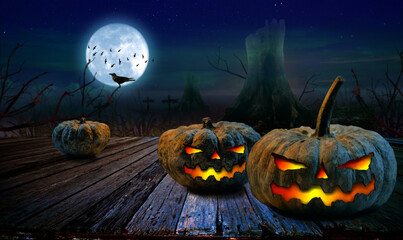 Halloween pumpkin on an old wooden table Halloween background in forest night with moon.