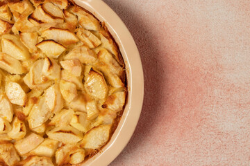 Freshly baked clafoutis pie with apples. Apple pie. Top view.