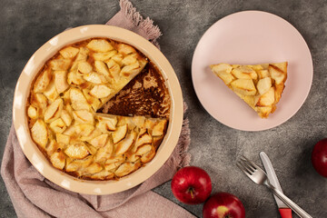 Freshly baked clafoutis pie with apples. Apple pie. Top view.