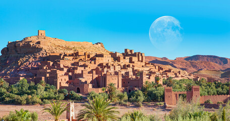 Panoramic View on Ait Ben Haddou near Ouarzazate river, Atlas Mountains, Morocco, North Africa with full moon  "Elements of this image furnished by NASA "