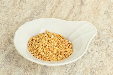 Crunched roasted peanut in the bowl