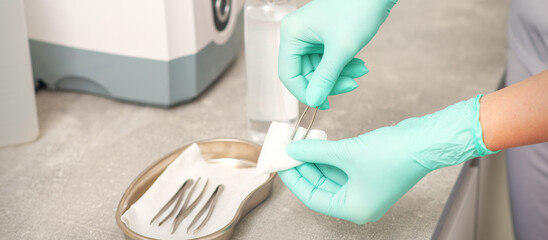 Hand disinfects tweezers with cleaning systems for medical instruments. Ultrasonic cleaner