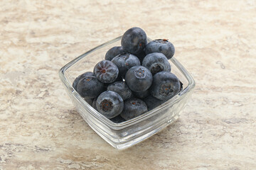 Sweet ripe blueberry heap in the bowl