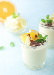 Orange lemon citrus milk mousse in glasses