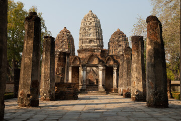 Access area to the Wat Si Sawai temple and pagodas of Thai style architecture, in Sukhothai Historical Park at sunset