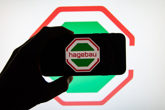 Rheinbach, Germany  4 March 2022,  The brand logo of the hardware store chain "Hagebau" on the display of a smartphone (focus on the brand logo)
