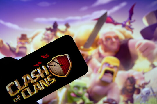 Rheinbach, Germany  4 November 2021,  The brand logo of the popular smartphone online game "Clash of Clans" on the display of a smartphone (focus on brand logo)