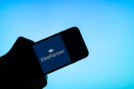 Rheinbach, Germany  4 March 2022,  The brand logo of the dating platform "Elitepartner" on the display of a smartphone (focus on the brand logo)