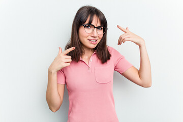 Young caucasian woman isolated on white background showing a disappointment gesture with forefinger.