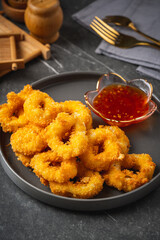Deep fried squid rings breaded with thai sauce.