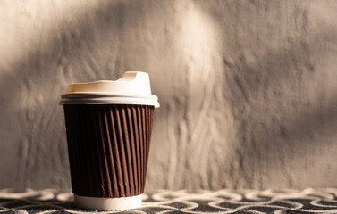 Paper coffee cup in coffee shop