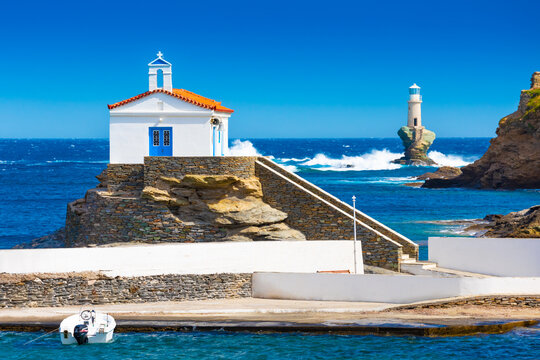 View of Mother of Lord Thalassini Holy Chapel and Lighthouse Tourlitis. Andros island, Greece