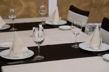 Banquet table with wineglasses. High angle of elegant banquet table served for wedding celebration