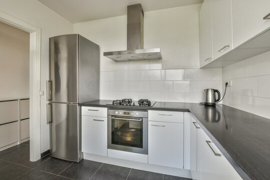 Modern kitchen interior with cupboard at home