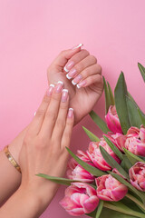 Perfect done female French manicure.