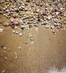 Fototapeta na wymiar pebbles on the sand