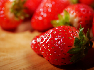 Fresh strawberries ripe for eating macro close up