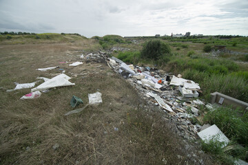 garbage dumped on derelict former industrial land