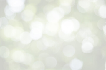 Obraz premium Abstract blurred yellow background with glittering stars for displaying promoting and advertising products and content in a happy christmas and new year season collection concept.