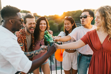 Friends have rooftop party.