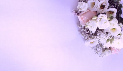 Obraz premium A gorgeous bouquet of white and pink roses on a light background. Background for a greeting card.
