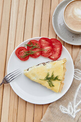 Vegetarian homemade mushrooms pie with Adyghe cheese, tomatoes and dill. Healthy breakfast