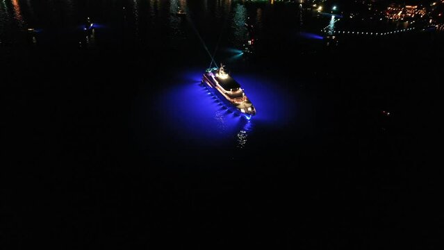 party at a luxury yacht at night, aerial view