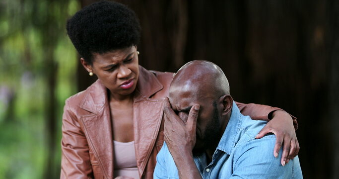 Black Woman Consoling Crying Depressed Man