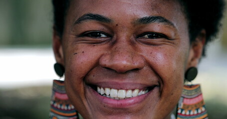 Black African woman smiling portrait face close-up 40s