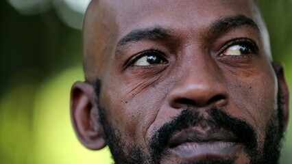 African man portrait face close-up smiling. Happy joyful black person