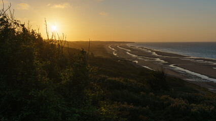 View over Omaha beach on the french atlantic coast during sunset, Colleville-sur-Mer, Normandy,...