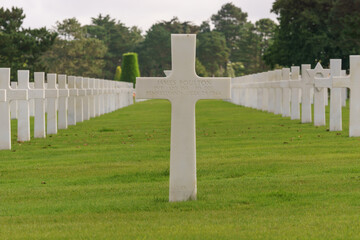 Rows of white crosses of fallen american soldiers at American War Cemetery at Omaha Beach Cimetiere Americain, Colleville-sur-Mer, Normandy, France