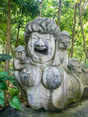 Fototapeta na wymiar Indonesia, Bali, Ubud. Statue in Bali Sacred Monkey Forest.