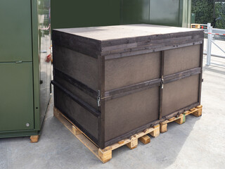 Boxes for industrial equipment. Large wooden box on two pallets. Concept transportation and storage...