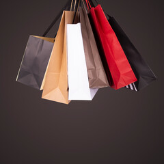 Colorful shopping bags in dark background